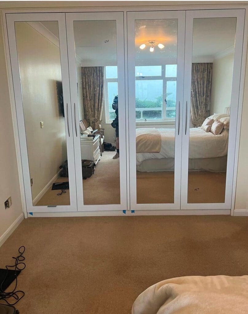 New dresser door installation with mirrors